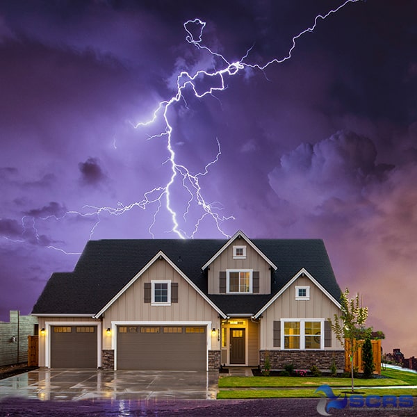 Residential home roof being struck by lightning needing storm damage roof repair by SCRS in St. Louis, MO